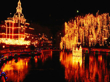 Lake in Tivoli Gardens Illuminated for Christmas Market, Copenhagen, Denmark